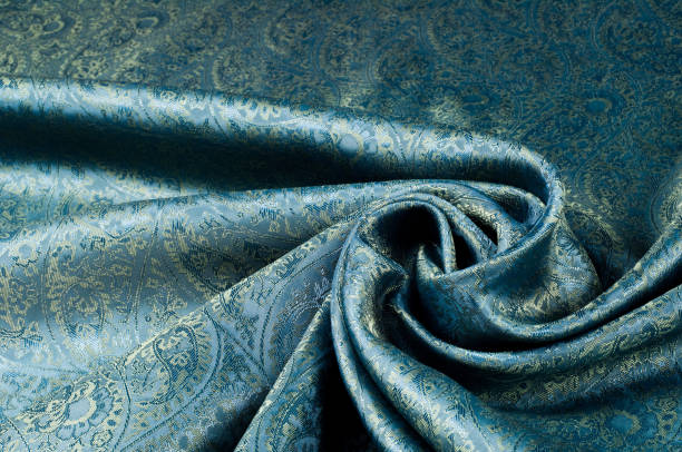 istock Background texture, pattern. Blue paisley silk chiffon mod fabric by the yard. Crinkled, flowy, soft, very light, 956321746