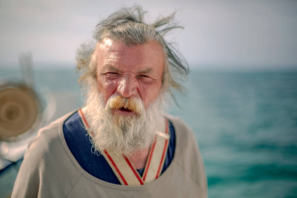 istock Old fisherman by the sea 956321926