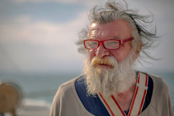 istock Old fisherman by the sea 956322048