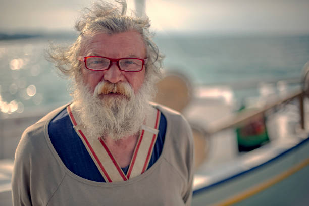 istock Old fisherman by the sea 956322174