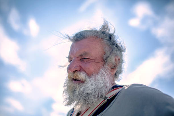 istock Old fisherman by the sea 956322220
