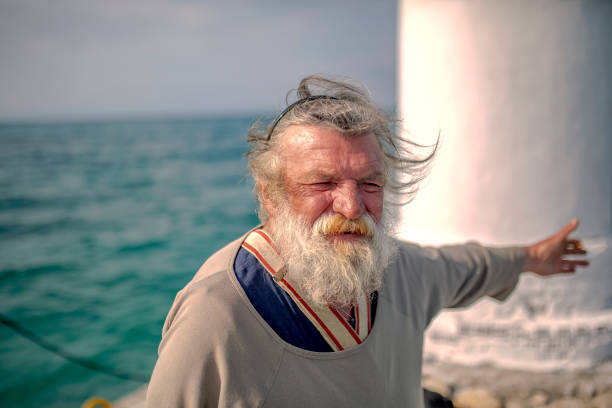 Old fisherman by the sea