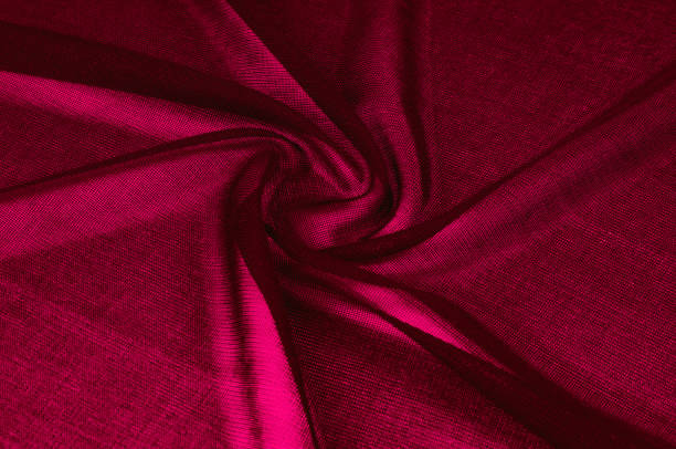 istock Texture, background, pattern. Red transparent fabric. Organza Silk Fabric Hand Dyed Madder Pale orange rust Red tangerine transparent natural plant 956322434
