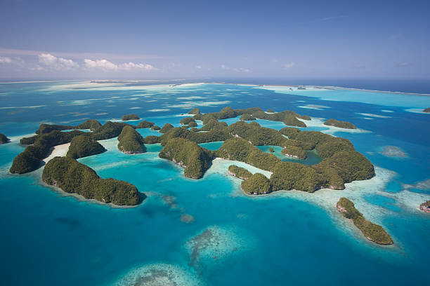 Aerial view of Palaus Seventh Islands An aerial view of Palau's famous Seventy Islands Nature Reserve. palau stock pictures, royalty-free photos & images