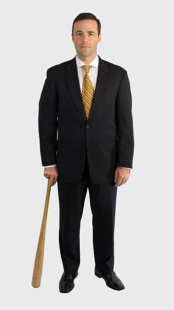 istock Businessman in black suit with baseball bat 95633389