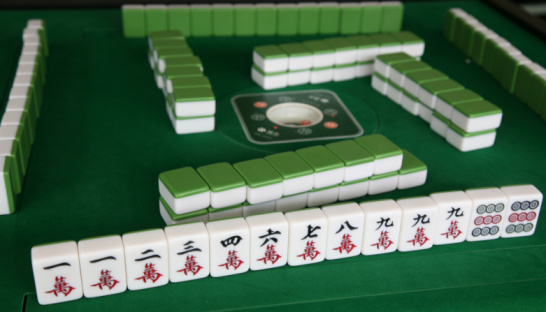 A selective focus shot of mahjong tiles on a table