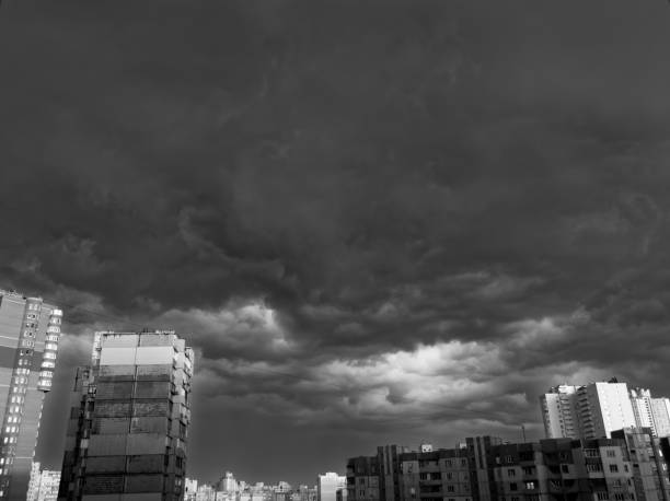istock Background of dark clouds before a thunder-storm. Monochrome. 956335980