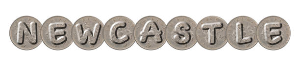 istock NEWCASTLE  written with five new pence coins on white background 956337482