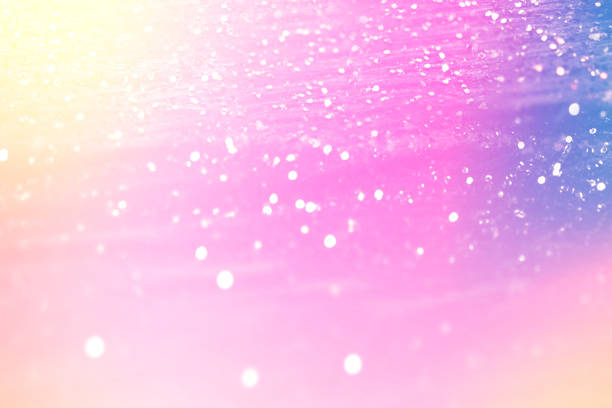 istock Glittering gradient background  with hologram effect and magic lights. Holographic  abstract fantasy  backdrop  with fairy sparkles, gold stars and festive  blurs. 