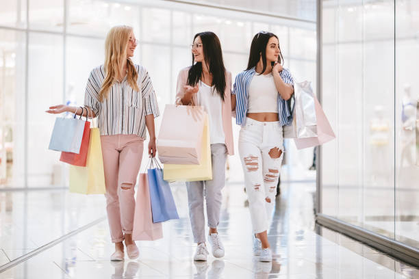 istock Girls at shopping center 956344204