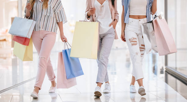 istock Girls at shopping center 956344240
