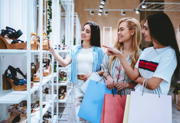 istock Girls at shopping center 956344722