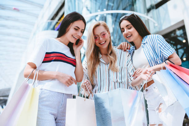 istock Girls at shopping center 956344866