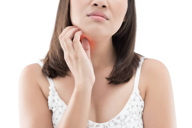 istock Woman itching his chin isolated on white background 956345308