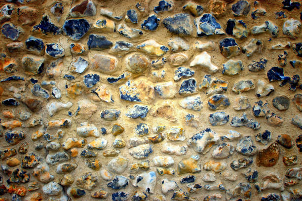 Flint wall textured background Flint wall textured background if an exterior wall in East Anglia bury st edmunds photos stock pictures, royalty-free photos & images