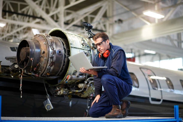 istock Aircraft mechanic in the hangar 956347458