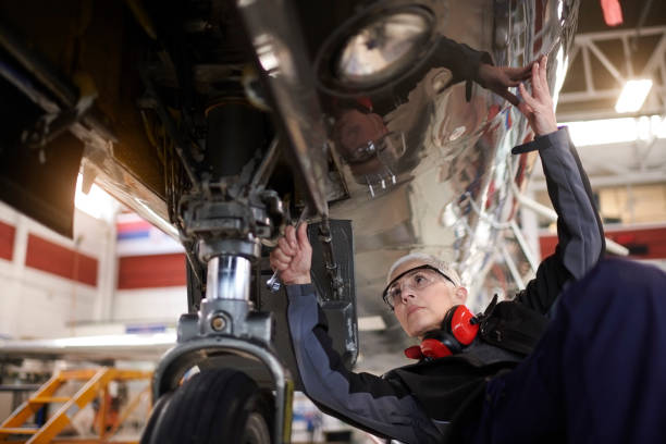 istock Aircraft mechnic in the hangar 956348008