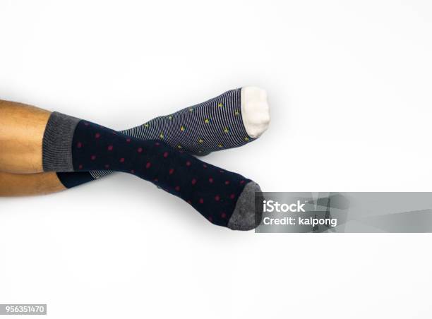 Wearing Different Pair Of Sock On White Background Stock Photo - Download Image Now - Sock, Men, Mismatch