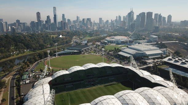 Melbourne, Australia - April 23, 2018: AAMI Park in Melbourne, with Melbourne city in the background.  AAMI Park is an outdoor Rectangular Stadium, which holds sports and entertainment events throughout the year.  It opened in May 2010 and holds approx 30,000 people.