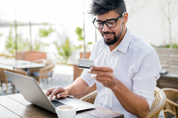 istock On-line banking from favorite cafe place 956361652