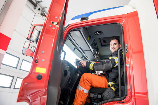 istock Firefighter driving a fire truck 956363862