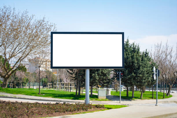 istock Large blank billboard located on the side of the road. 956367240