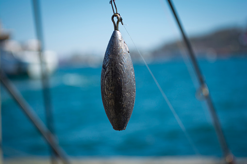 Peso de plomo o plomo que se utiliza para la pesca photo