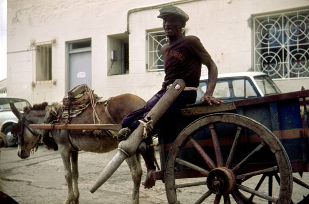 Caribbean, Bridgetown, Barbados, 1976. Local entrepreneur on his cart named 