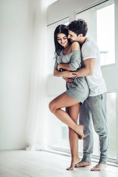 istock Love couple at home 956369620