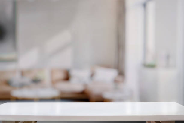 istock Empty white wood table in living room background. 956372066