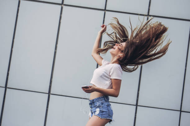istock Beautiful teenager having fun 956373206
