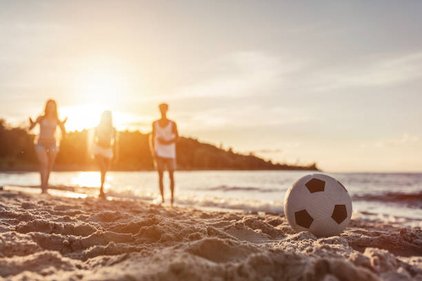 footblall ball on white  beach sand