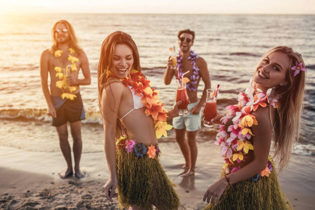 istock Group of friends on beach 956377842