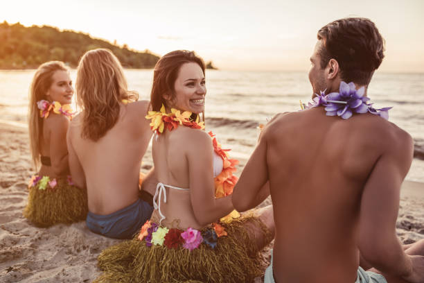 istock Group of friends on beach 956377920