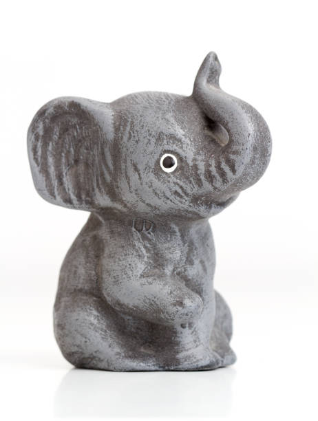 istock gray figurine of an elephant 5 956382556