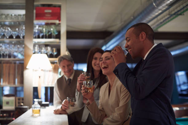 Business retreats, Drinking in the bar, happy hour.