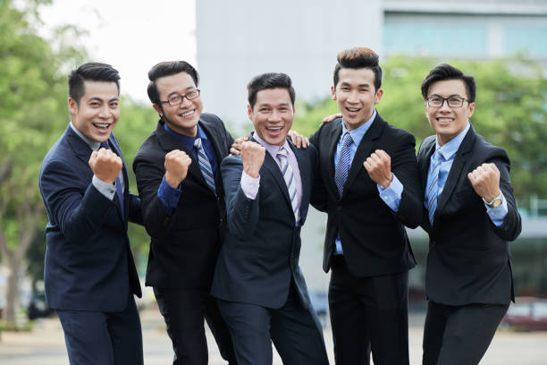 istock Asian Entrepreneurs Celebrating Victory 956390416