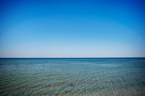 istock the blue ocean with dull clouds on a lovely sunny day 956396302