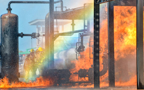 istock Fire fighters battling a blaze at oil pipeline refinery 956396716
