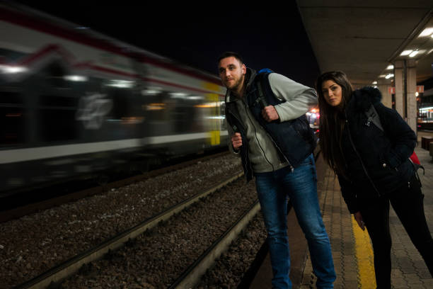 istock Young couple waiting for train 956400120