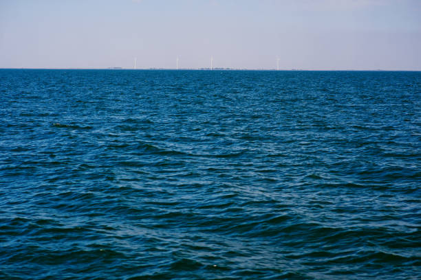 the blue ocean with dull clouds on a lovely sunny day.
