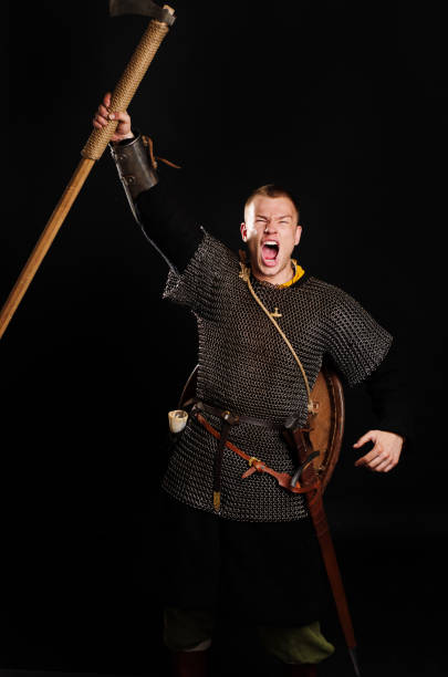 Medieval Viking armored attack with a battle-ax.