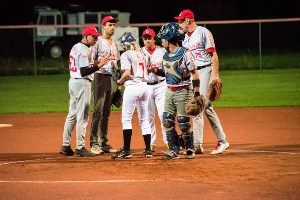 istock Softball Team Together on Playing Field 956411540