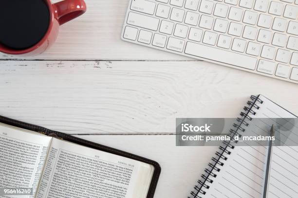 Bible Study On A White Wood Computer Table Stock Photo - Download Image Now - Bible, Computer, Note Pad