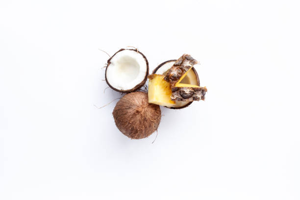 istock pineapple and coconut on a white background 956416338