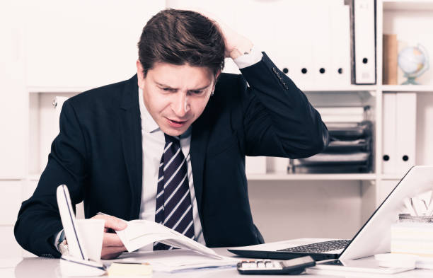 istock Male having lot of work and problems 956416502