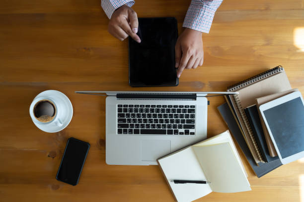 istock Overhead View top view man Working Desk Concept 956420216