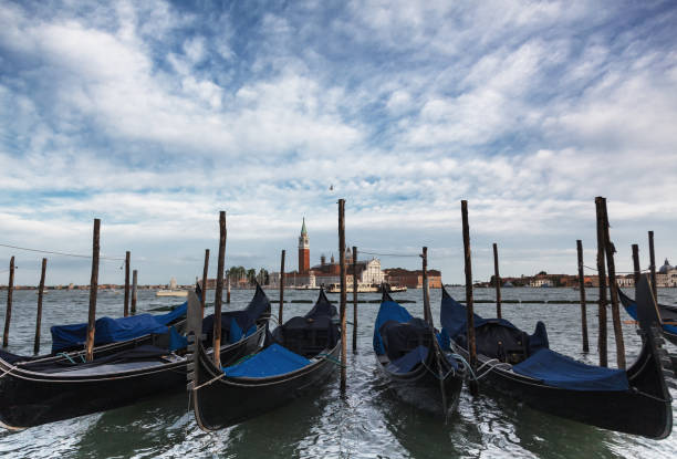 istock Traditional Gondolas in St Marco or Saint Mark's square in Venice 956421056