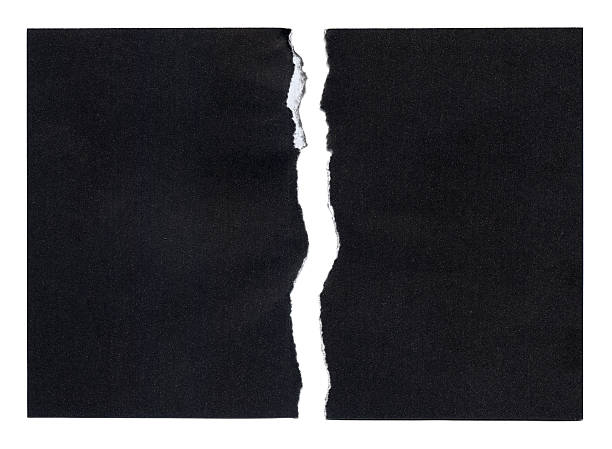 Ragged BlackPaper Torn piece of black Paper ready to accept any message. run down photos stock pictures, royalty-free photos & images