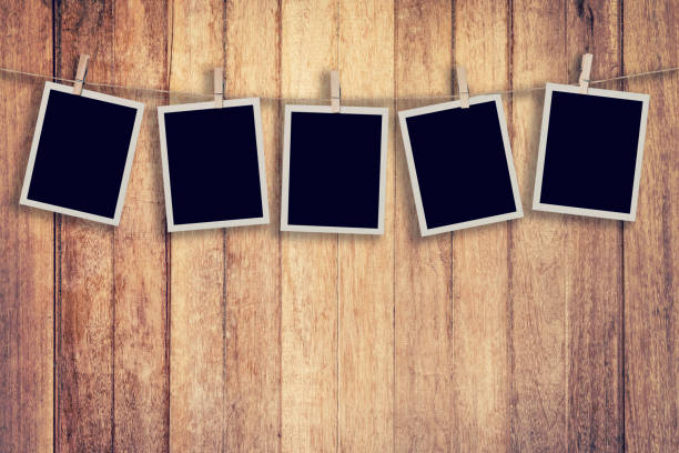 Five instant photo on Wood Background and Texture vertical, Vintage toned. Five instant photo on Wood Background and Texture vertical, Vintage toned. string photos stock pictures, royalty-free photos & images